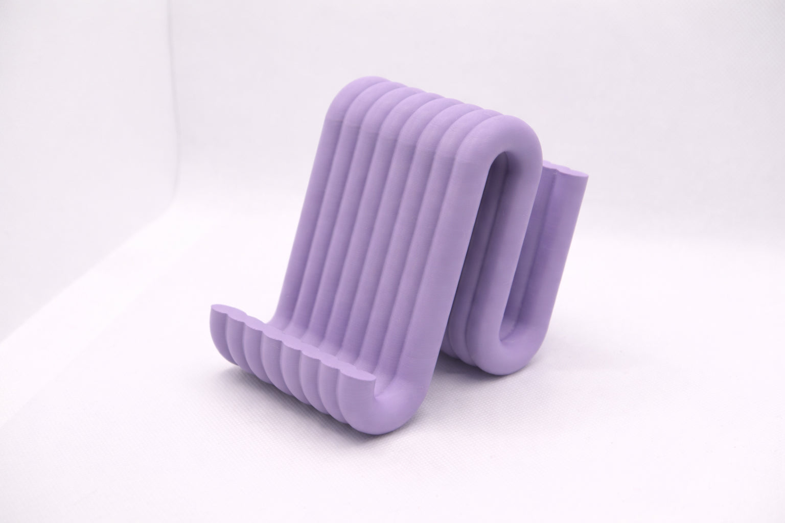 Wiggle mobile phone stand