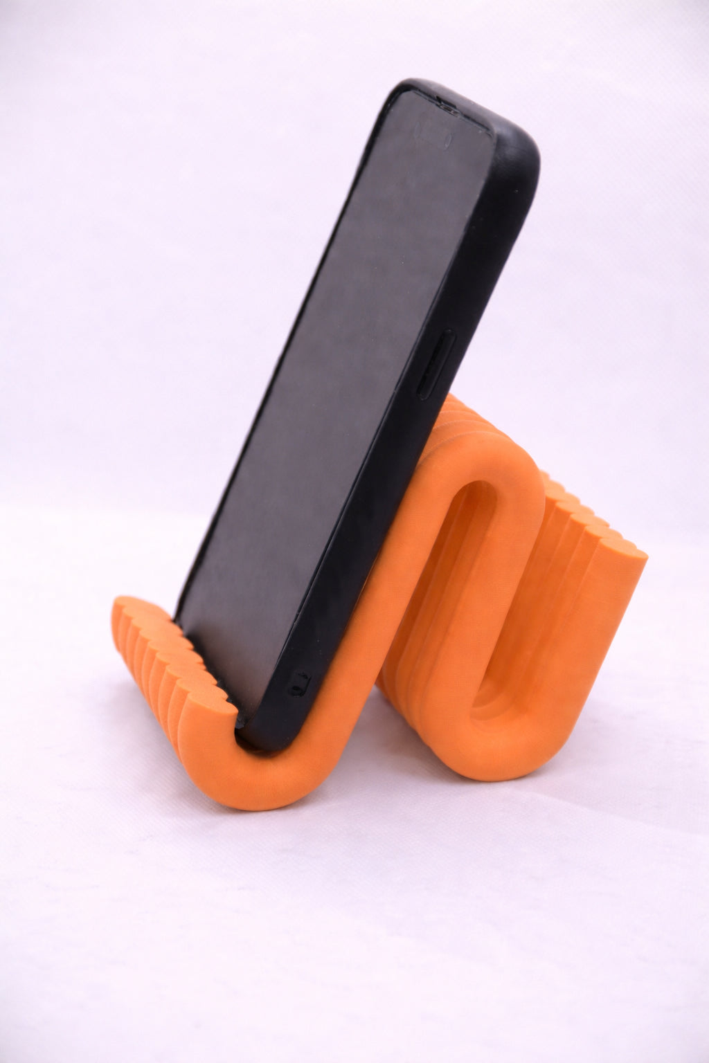 Wiggle mobile phone stand