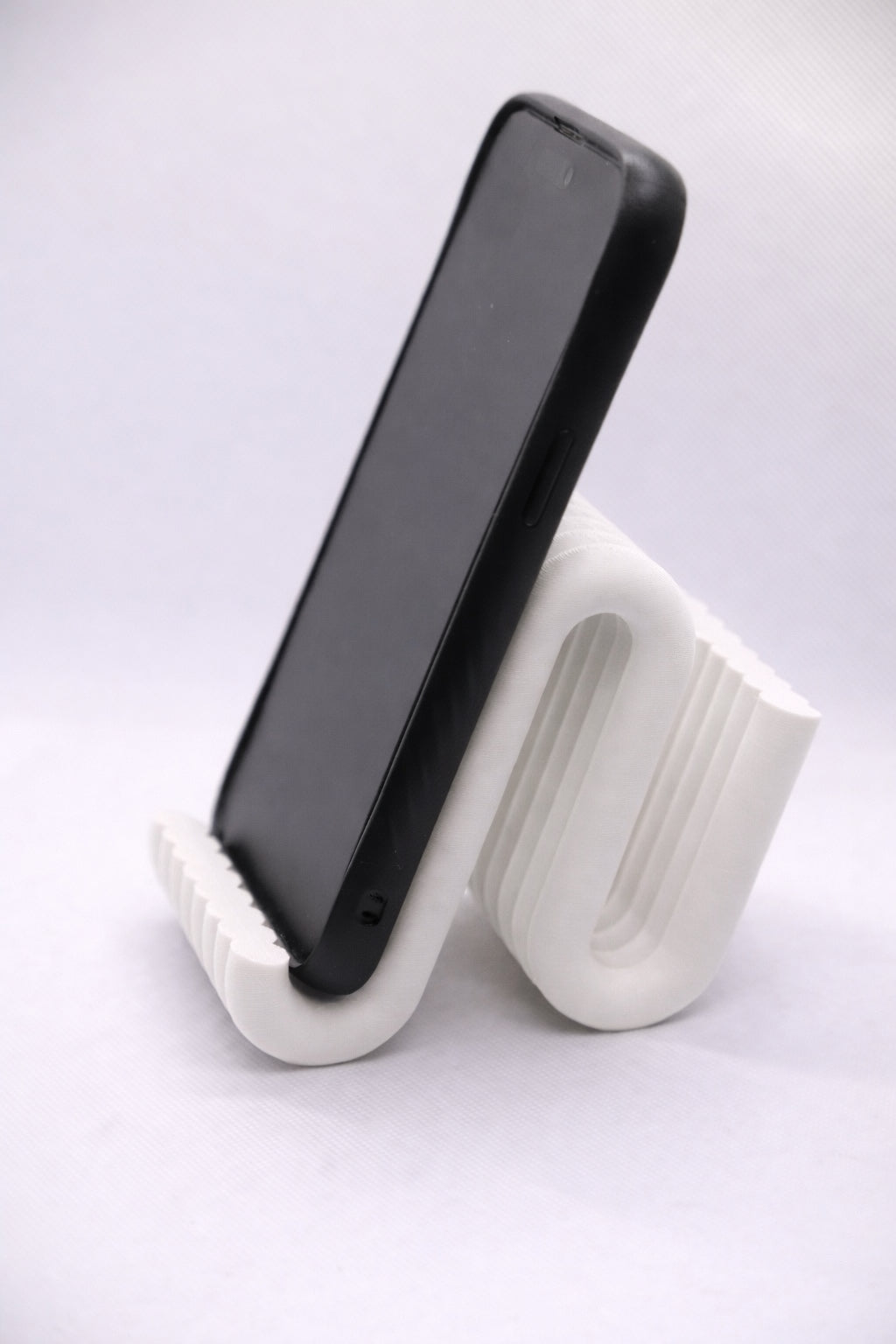 Wiggle mobile phone stand