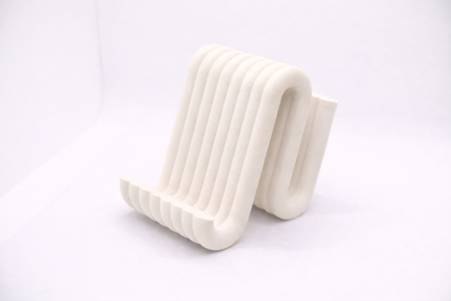 Wiggle mobile phone stand