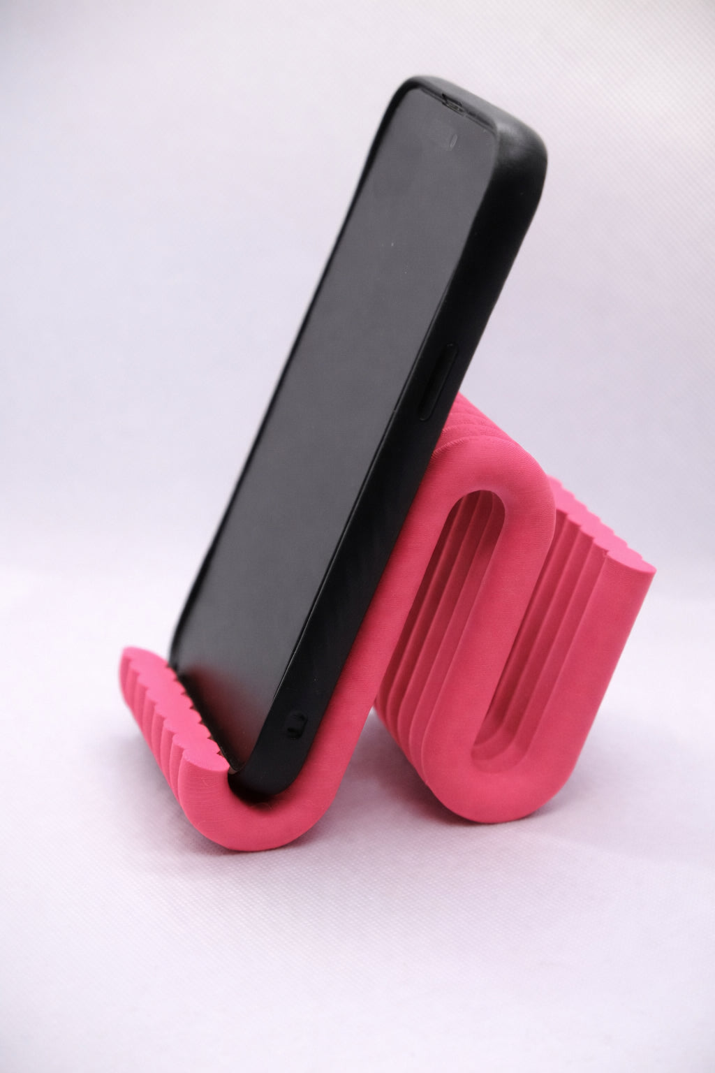 Wiggle mobile phone stand