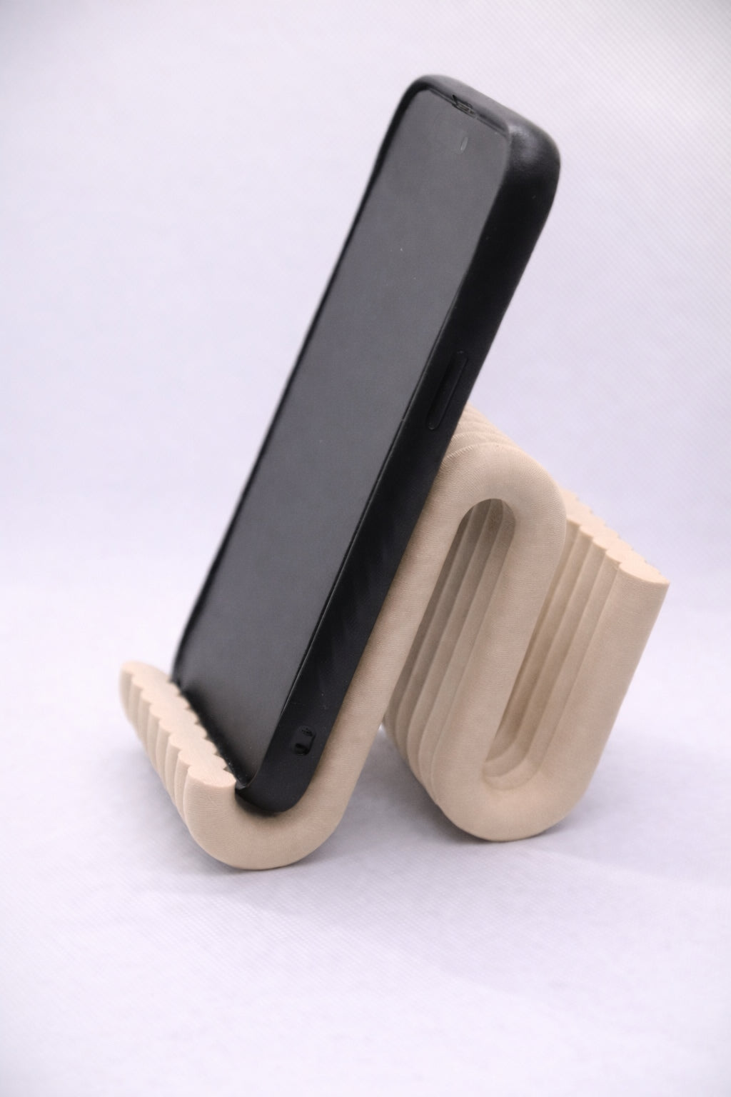 Wiggle mobile phone stand