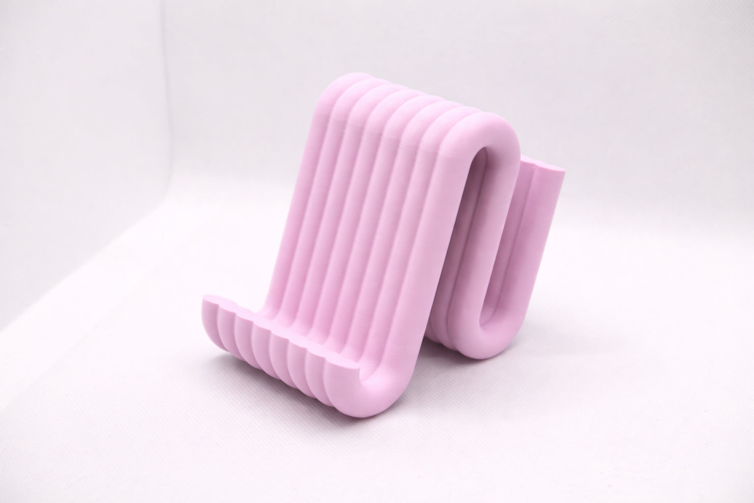 Wiggle mobile phone stand