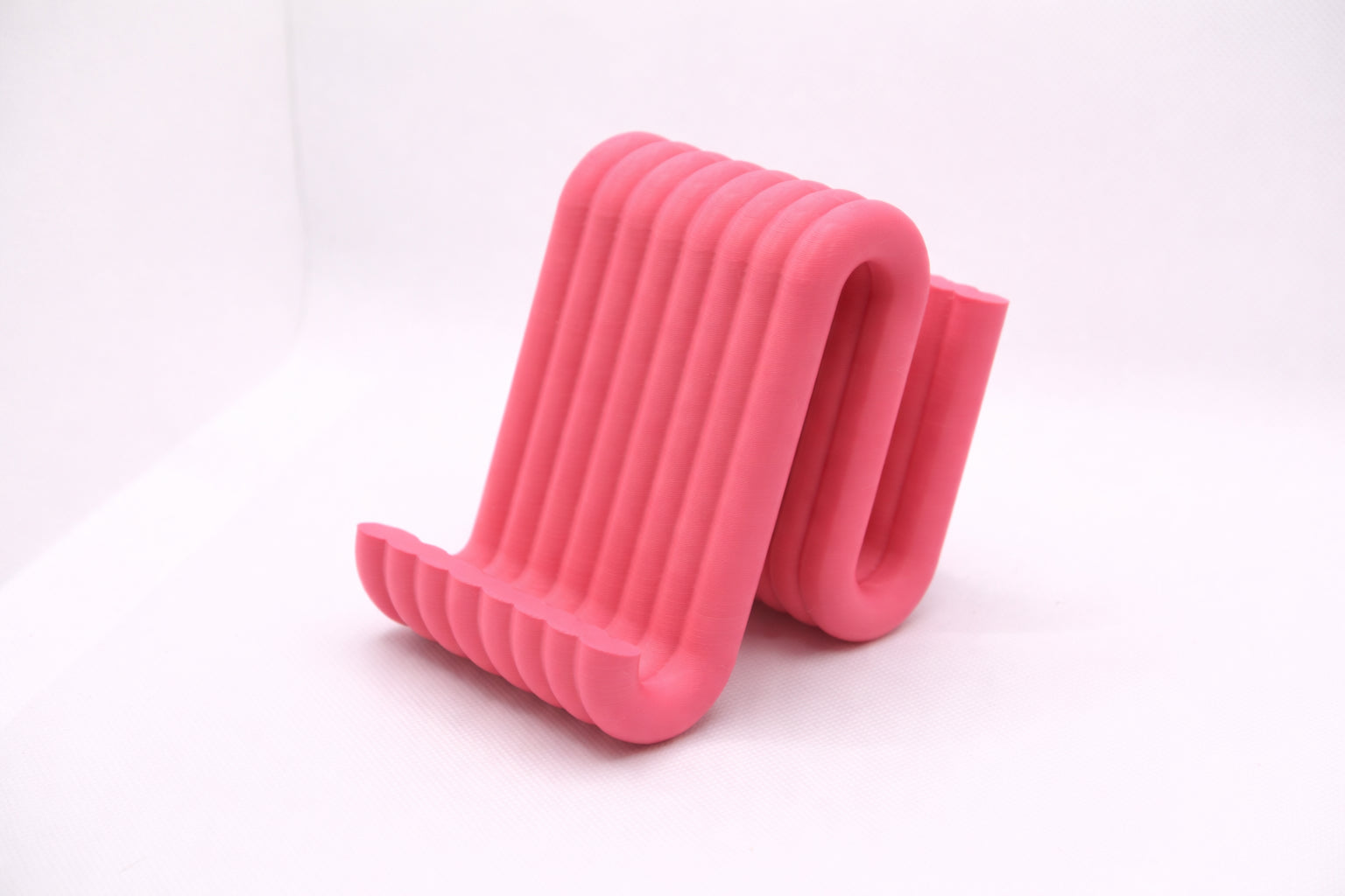 Wiggle mobile phone stand